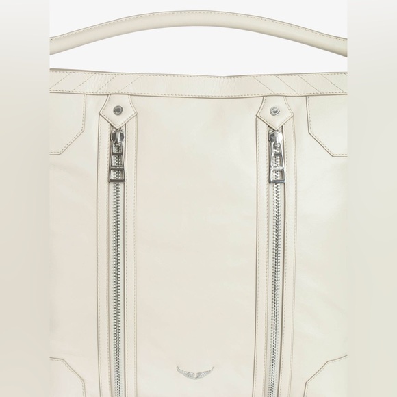 ZADIG& VOLTAIRE
Vintage-effect patent leather hobo bag.handle signature wings. - Picture 7 of 11